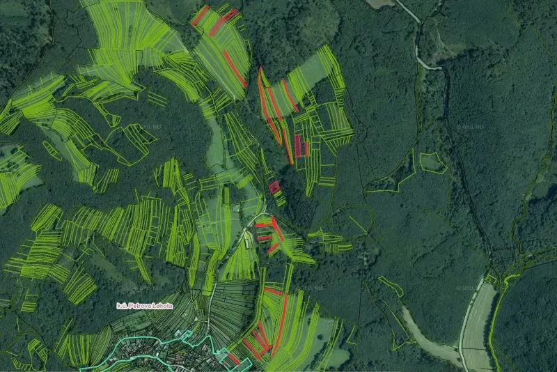 Aerial view of agricultural and forest lands around Petrova Lehota.