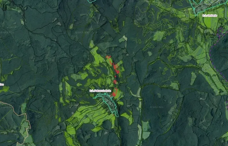 Aerial view of agricultural and forest lands around Petrova Lehota.