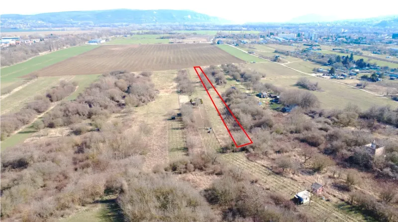 Aerial view of gardens in Štúrovo with a marked plot, surrounded by fields and nature.