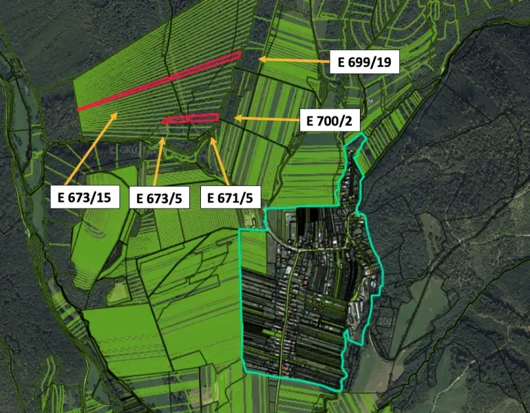 Aerial view of agricultural and forest lands around Nevidzany with marked parcels.