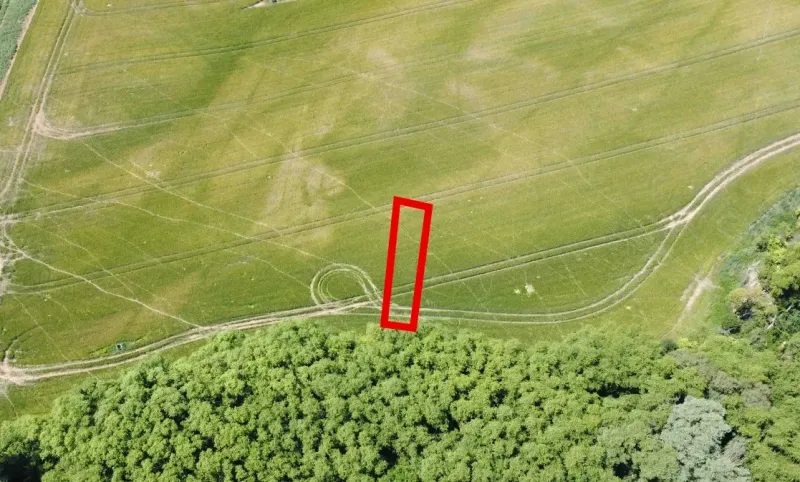 Aerial view of agricultural and forest lands around Kozárovce.