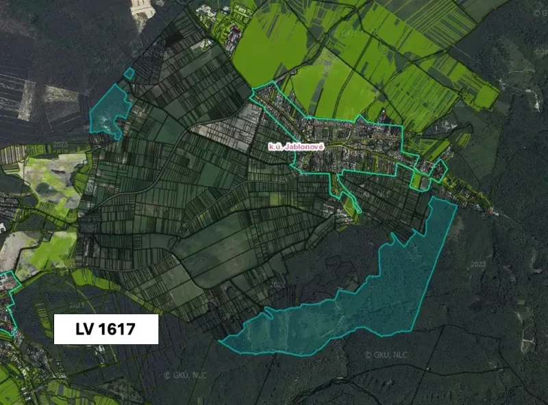 Aerial view of agricultural and forest lands around the village of Jablonové.