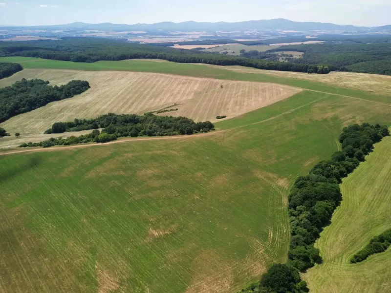 Aerial view of agricultural and forest lands in the village of Žitná - Radiša.