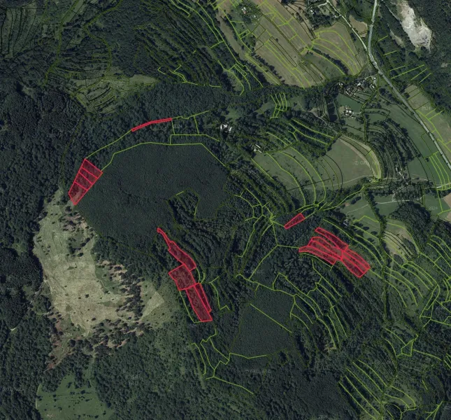 Aerial view of agricultural and forest lands around Horný Tisovník.