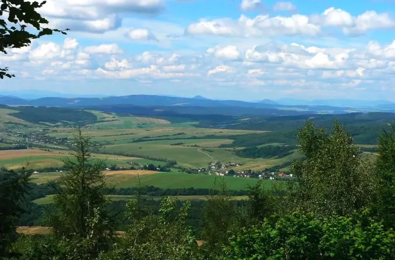 A landscape with extensive agricultural and forest lands around Valentovce, surrounded by nature.