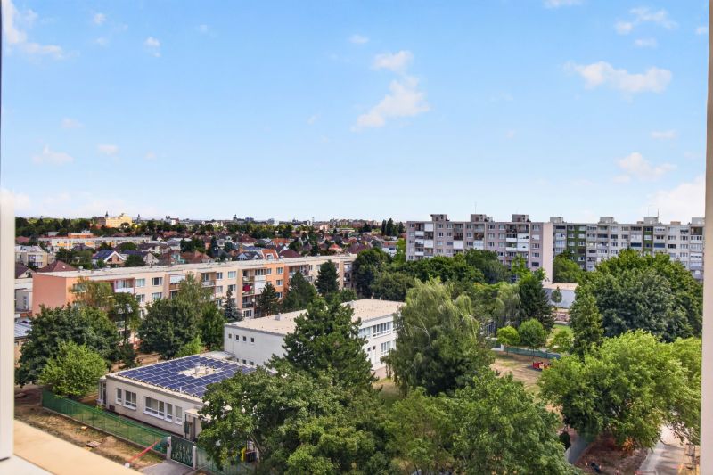 View from Jiráskova Street towards the housing estate and greenery in Trnava.
