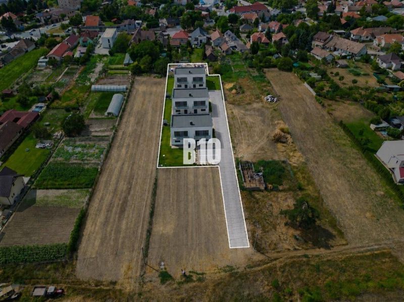 Aerial view of residential plots in Tomášov on Podzáhradná Street.