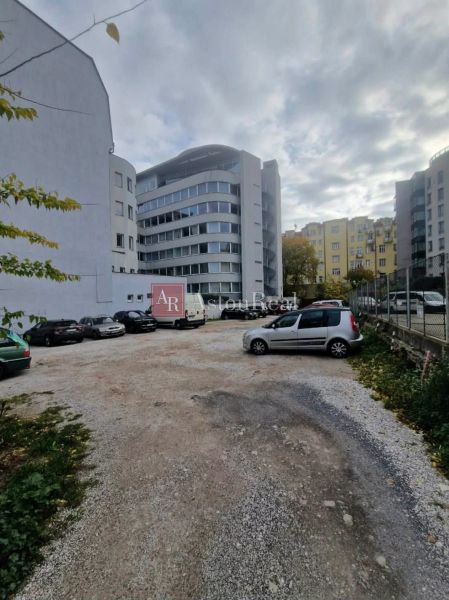 Parking lot with cars between buildings on Stefanicova Street in Bratislava, Old Town.