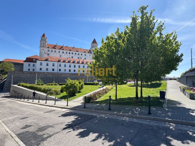 Bratislava Castle with its courtyard and surrounding greenery.