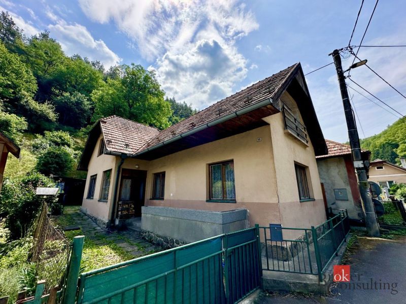 A family house in Žiar nad Hronom surrounded by greenery, in a peaceful location.