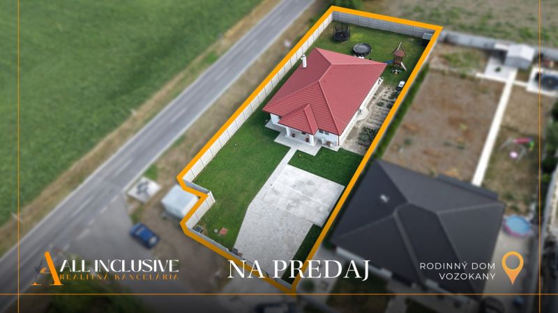 Family house in Vozokany with a red roof and a landscaped lawn for sale.