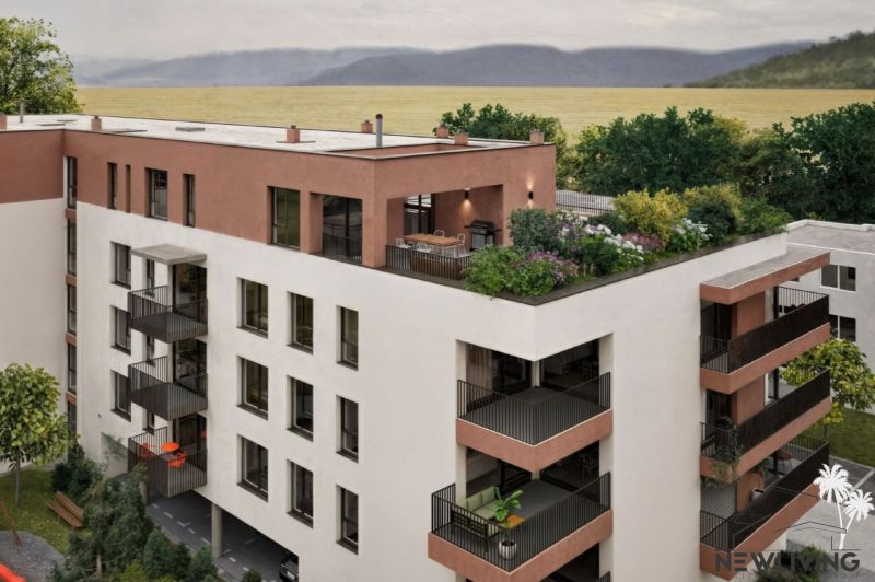 A new building on Brigádnická Street in Piešťany with a terrace and greenery, suitable for residential living.