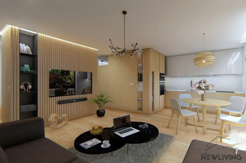 Living room of a three-room apartment with a wooden decor floor and a dining area.