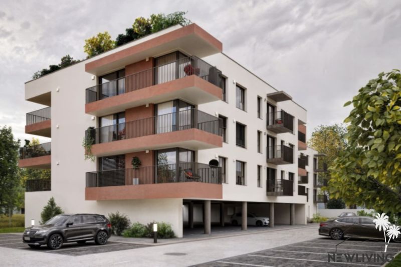 Three-story apartment building with balconies on Brigádnicka Street in Piešťany.