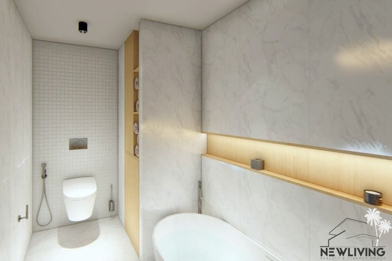 A bathroom in a 3-room apartment with a bathtub, toilet, and wooden storage space.