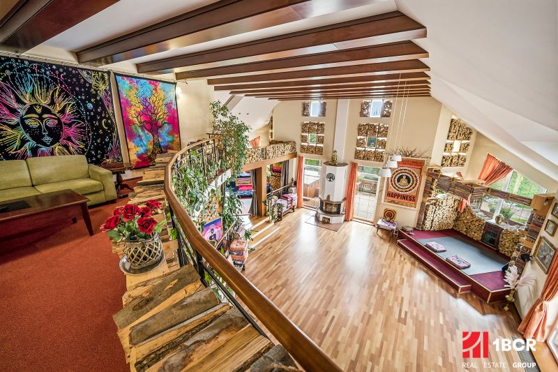 Colorful interior of a family house with a wood-patterned floor and decorative decorations.