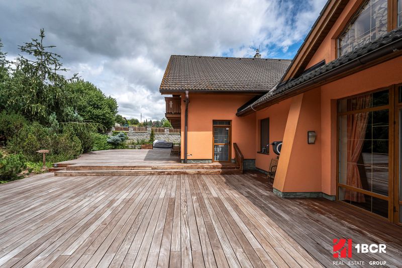 A family house in Veľká Lomnica with a terrace and wooden decor.