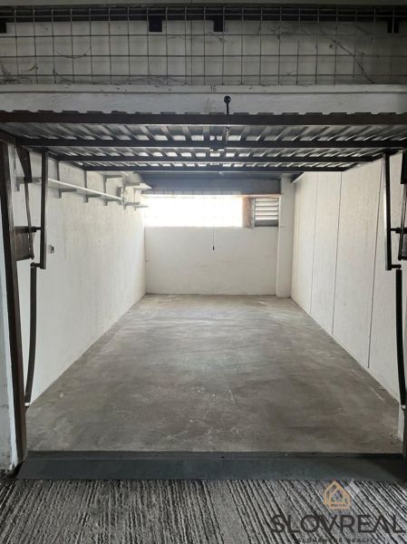 Spacious garage with a concrete floor on Púpavová Street in Karlova Ves, Bratislava.