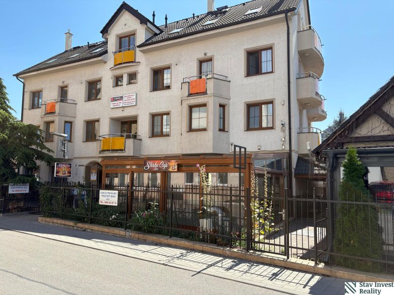 Commercial premises on Turecká Street in Senec, a multi-story building with a garden.