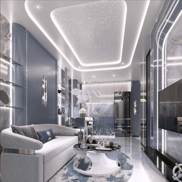 A recreational apartment with glossy surfaces, LED lighting, and a comfortable sofa.