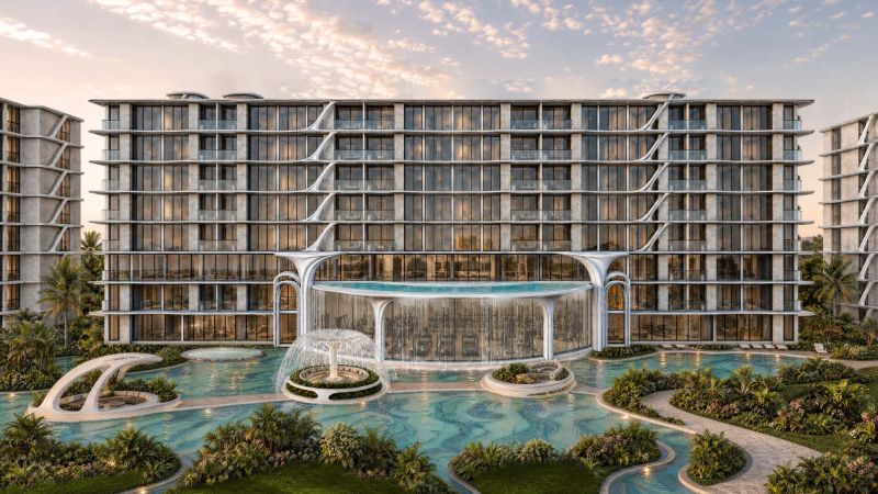 Recreational apartment in Pattaya with a water fountain and modern architecture in a tropical setting.