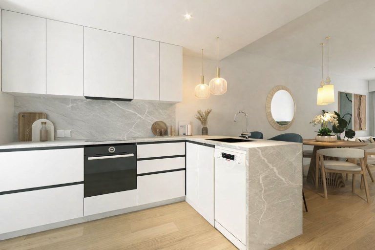 A kitchen in a 3-room apartment with white cabinets and a wooden decor floor.
