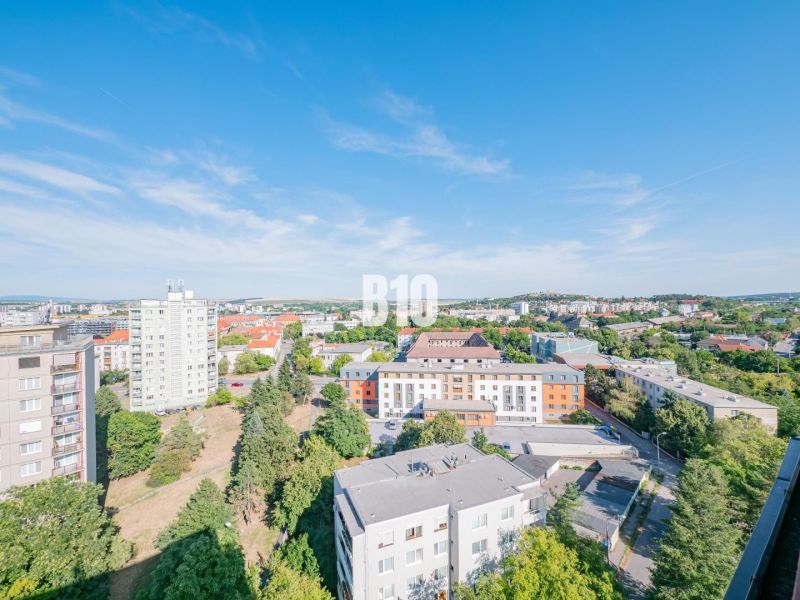 View from a 3-room apartment of the city of Nitra, with diverse architecture and greenery.