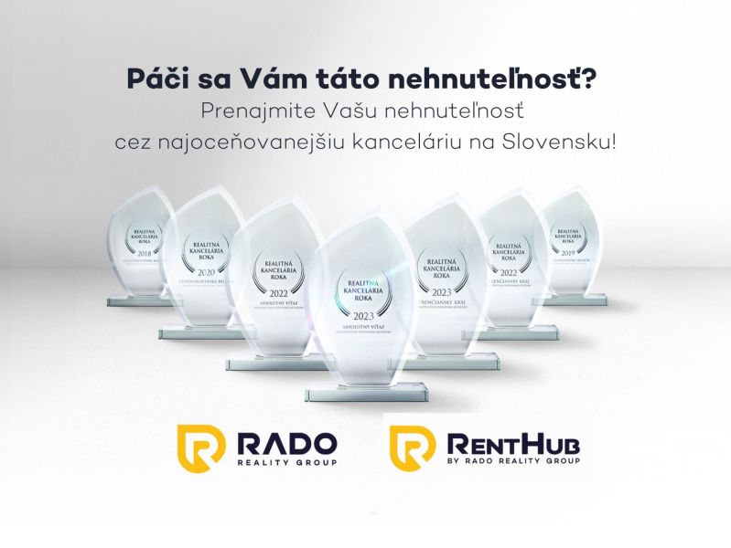 RADO Reality Group trophies display awards for real estate achievements in Slovakia.