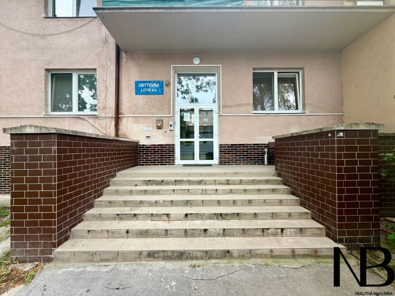 The entrance to the hostel on Dlhé Hony Street in Trenčín with a brick veneer.
