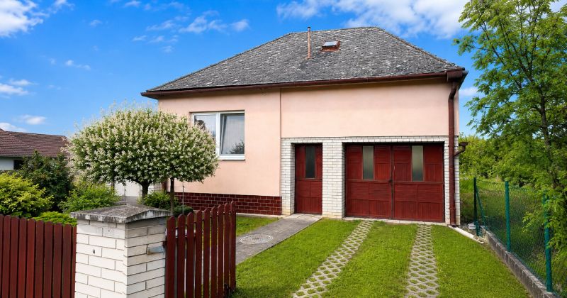 A family house on Gardom Street in Veľký Šariš with traditional architecture and a garden.