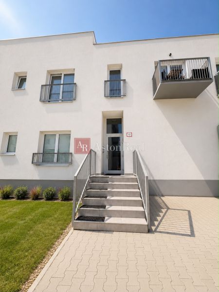 In Liptovský Mikuláš, there is a 3-room apartment with a balcony, and a staircase with a landscaped surrounding.