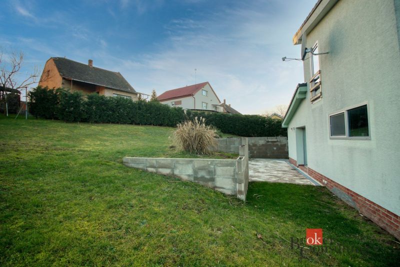A family house in Suchá nad Parnou with a spacious garden and a paved terrace.
