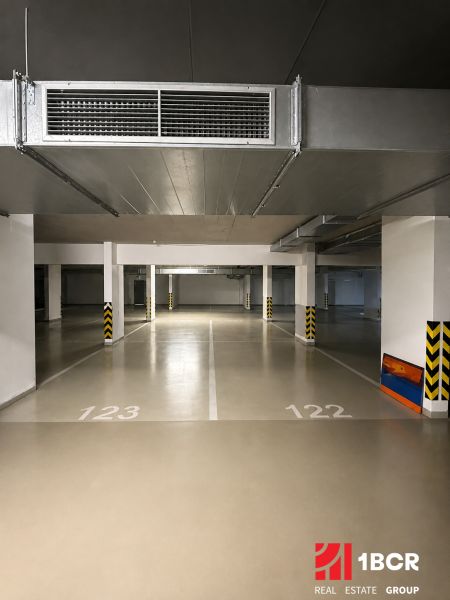 Underground parking spaces no. 122 and no. 123 in the residential building.