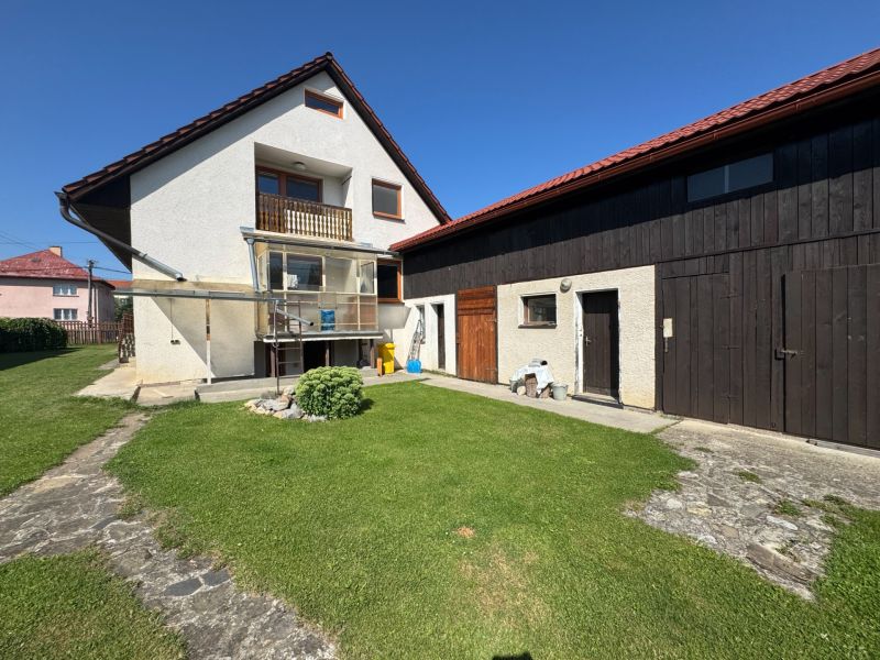 A family house in Liptovské Kľačany with two floors and a spacious yard.