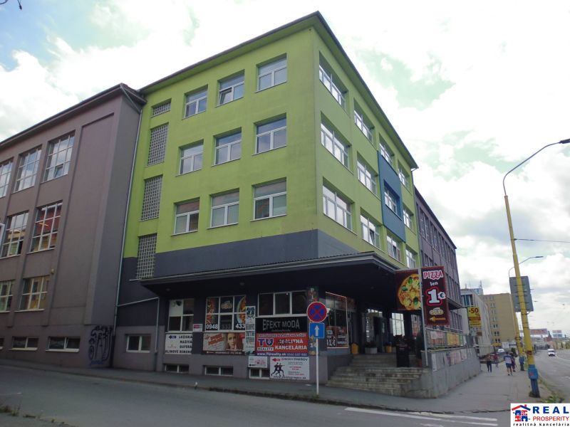 The building on Masaryk Street in Prešov contains offices and a pizzeria.