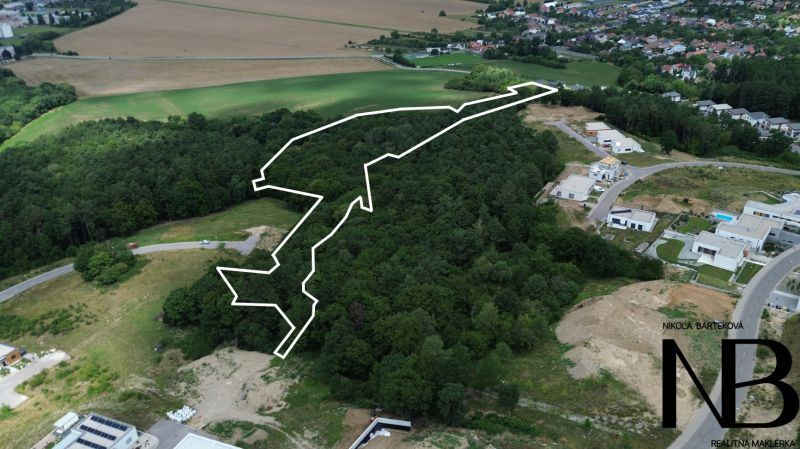Aerial view of agricultural and forest lands in Nova Dubnica on Jablonova Street.