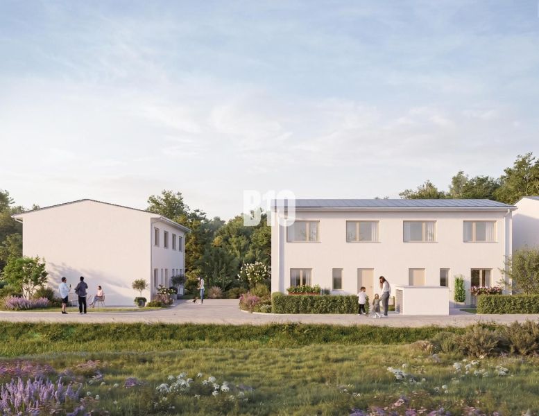 A family house in Nitra with a minimalist design and a landscaped garden.