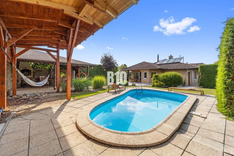 A family house in Nitra with a swimming pool, terrace, and a gazebo in the garden.