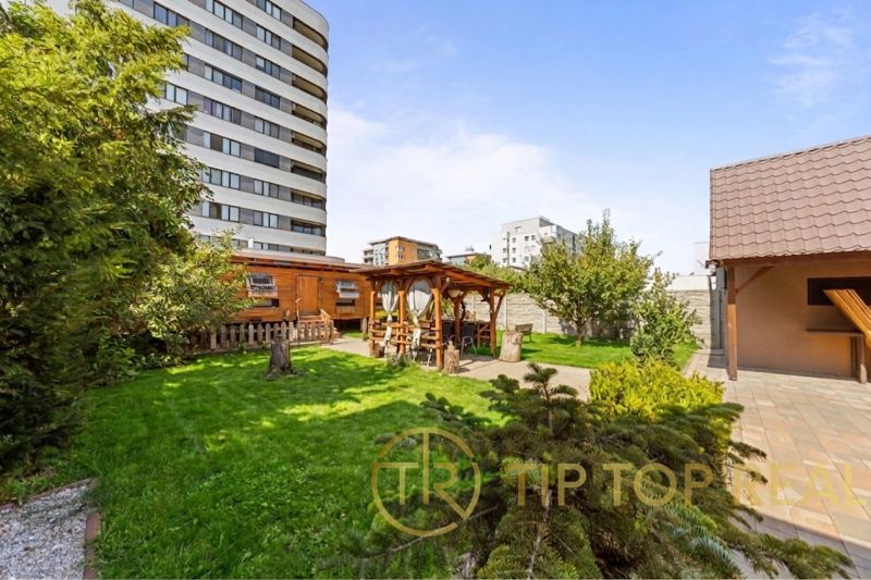 Garden with a gazebo at a family house on Kvetinárska Street, Bratislava - Podunajské Biskupice.