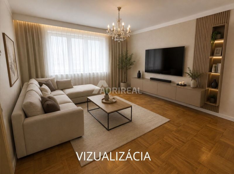 Living room with a corner sofa, TV, and wood-patterned flooring in a two-room apartment.