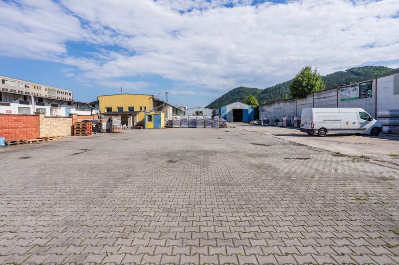 An area with paving and buildings on Zvolenská Road in Banská Bystrica.