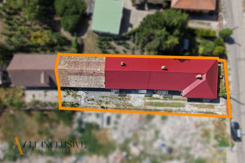 A family house in Vydrany with a red roof and an entrance from the garden.