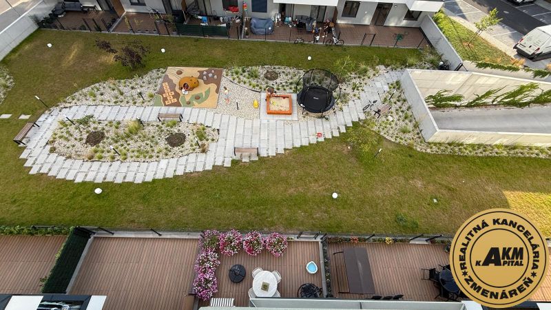 A children's playground in the garden of a 3-room apartment on Kubániho Street in Zvolen.