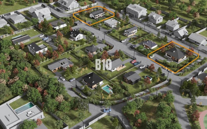 Aerial view of properties - housing in Nitra with green gardens and streets.