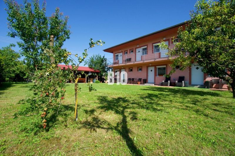A family house in Podhájska with a large garden and a gazebo for relaxation.