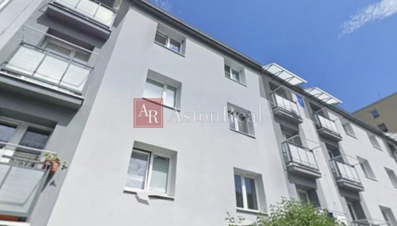 The exterior of the apartment building in Harmanec, Banská Bystrica, offers a 2-room apartment with a balcony.