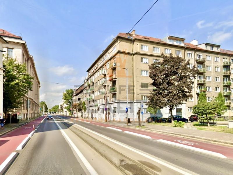 Vajanského nábrežie Street in Bratislava - Old Town with older apartment buildings.