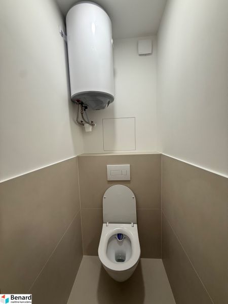 Toilet with wall-hung WC and boiler in a 3-room apartment.