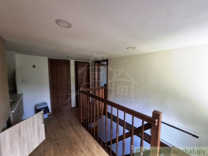 Wooden staircase and floor with wood decor in commercial premises.
