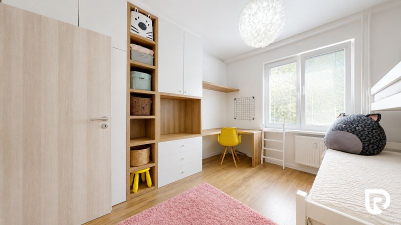 A closed room with storage spaces and a desk in a 3-room apartment.